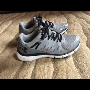 Under Armour sneakers.